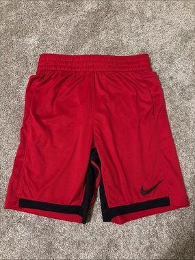 Nike Red Basketball Shorts with Black Accents and Swoosh